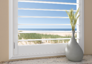 White Plantation shutter with 4 1/2" louvers